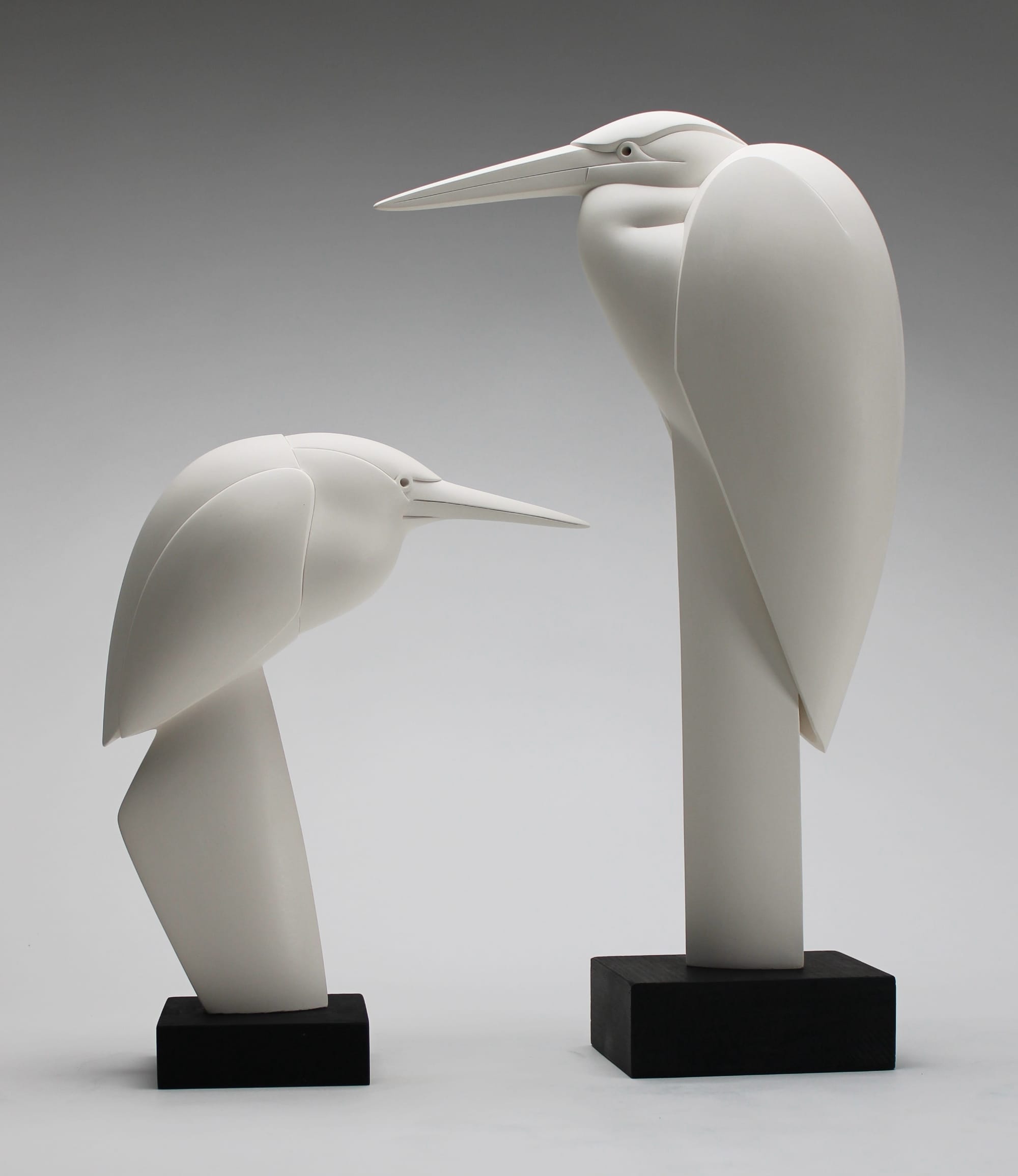 two stone bird sculptures by Anthony Theakston
