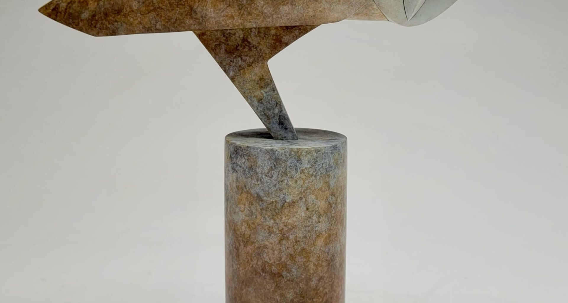 a stone owl sculpture by Anthony Theakston