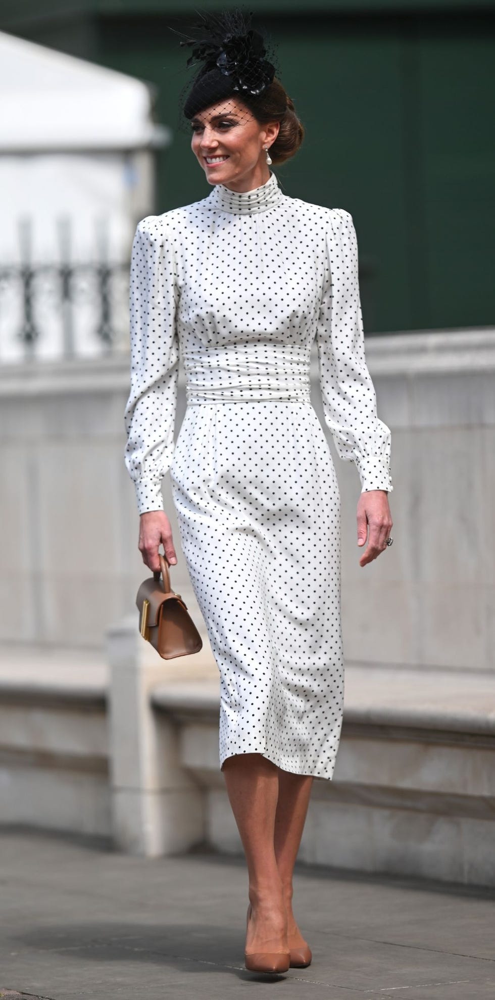 kate middleton wearing a white polka dot dress