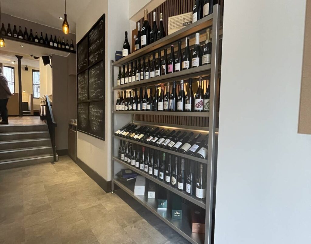 wall with bottles of champagne on