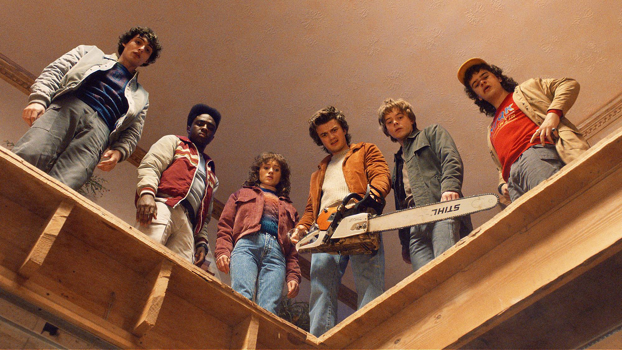 Finn Wolfhard as Mike Wheeler, Caleb McLaughlin as Lucas Sinclair, Natalia Dyer as Nancy Wheeler, Joe Keery as Steve Harrington, Charlie Heaton as Jonathan Byers, and Gaten Matarazzo as Dustin Henderson in "Stranger Things" season 5