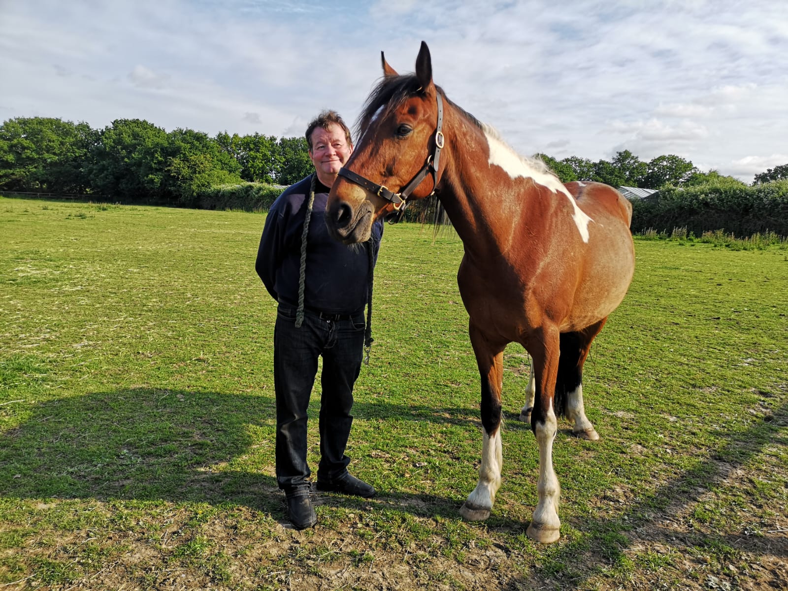 Mark Kennedy with his rescue horse Vincent.