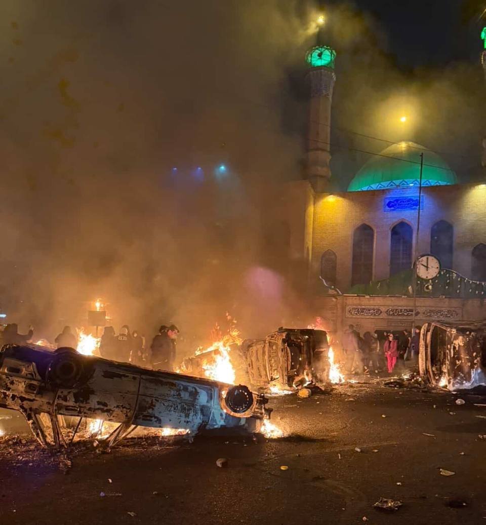 Burning cars in Kaj Square in Tehran as unrest spread