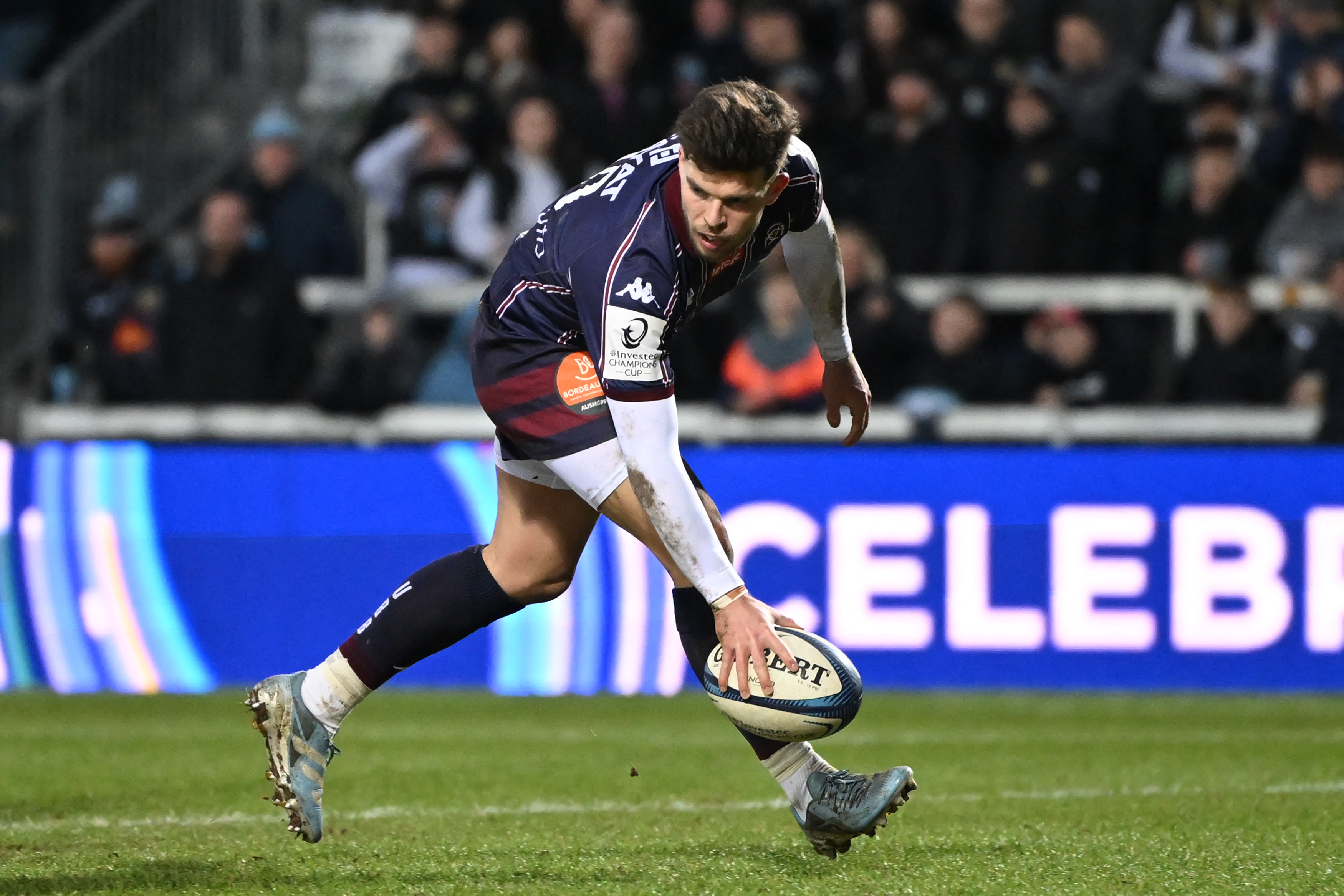 Bordeaux-Begles fly-half Matthieu Jalibert scores a try during the European Rugby Champions Cup match against Exeter Chiefs.