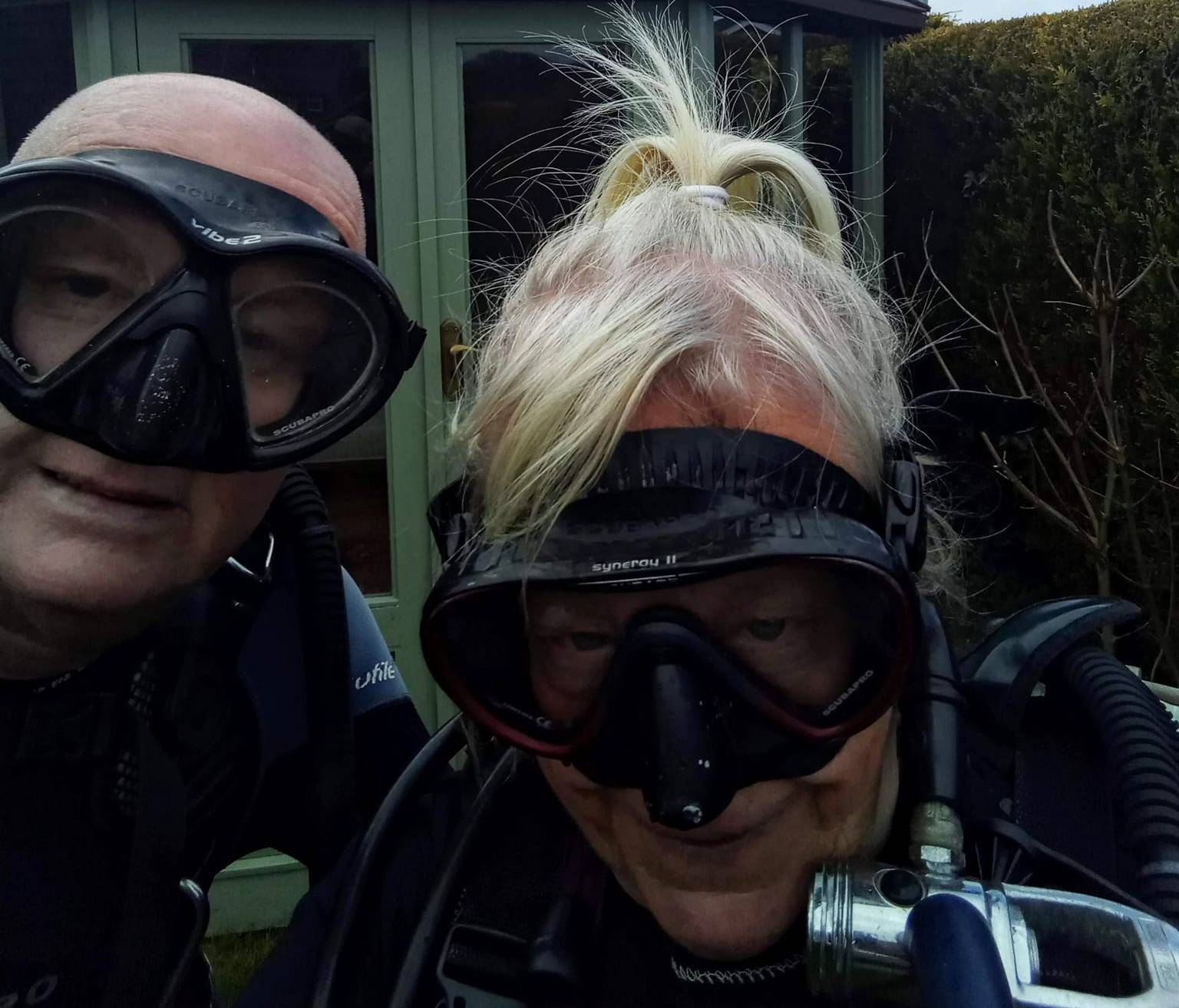 Malcolm and Elaine Richmond in scuba gear.