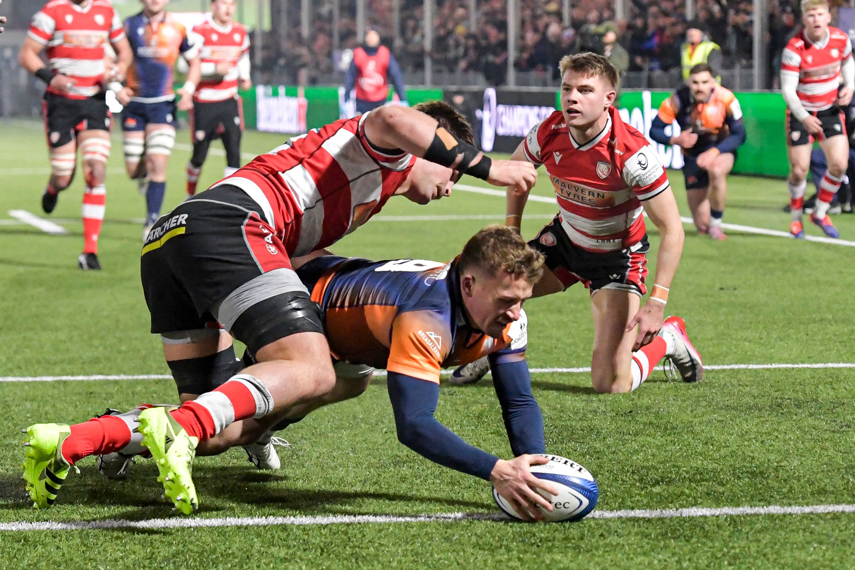 Ben Vellacott of Edinburgh Rugby scoring a try during a European Rugby Champions Cup match.
