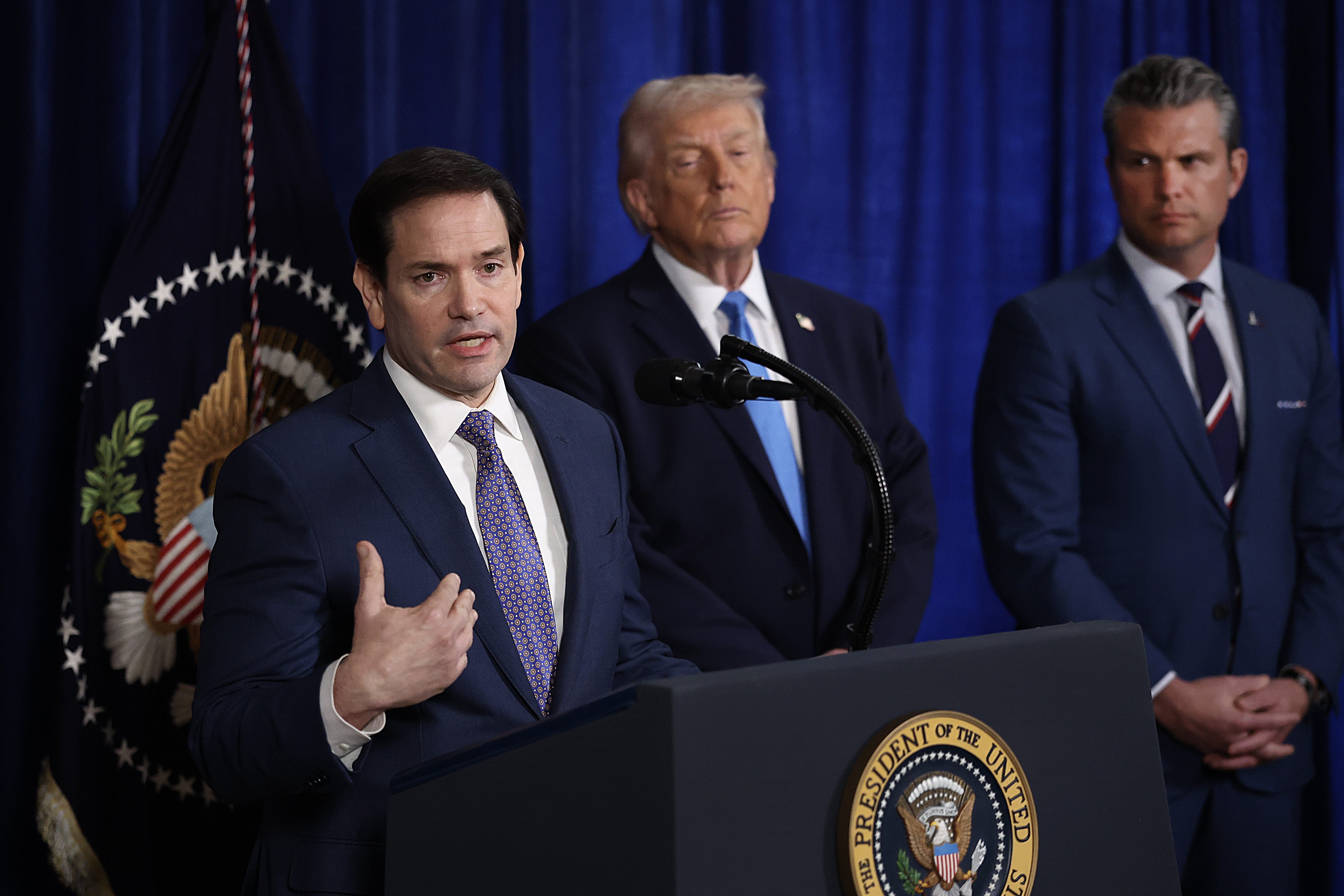 Secretary of State Marco Rubio speaks at a press conference with President Donald Trump and Secretary of War Pete Hegseth.