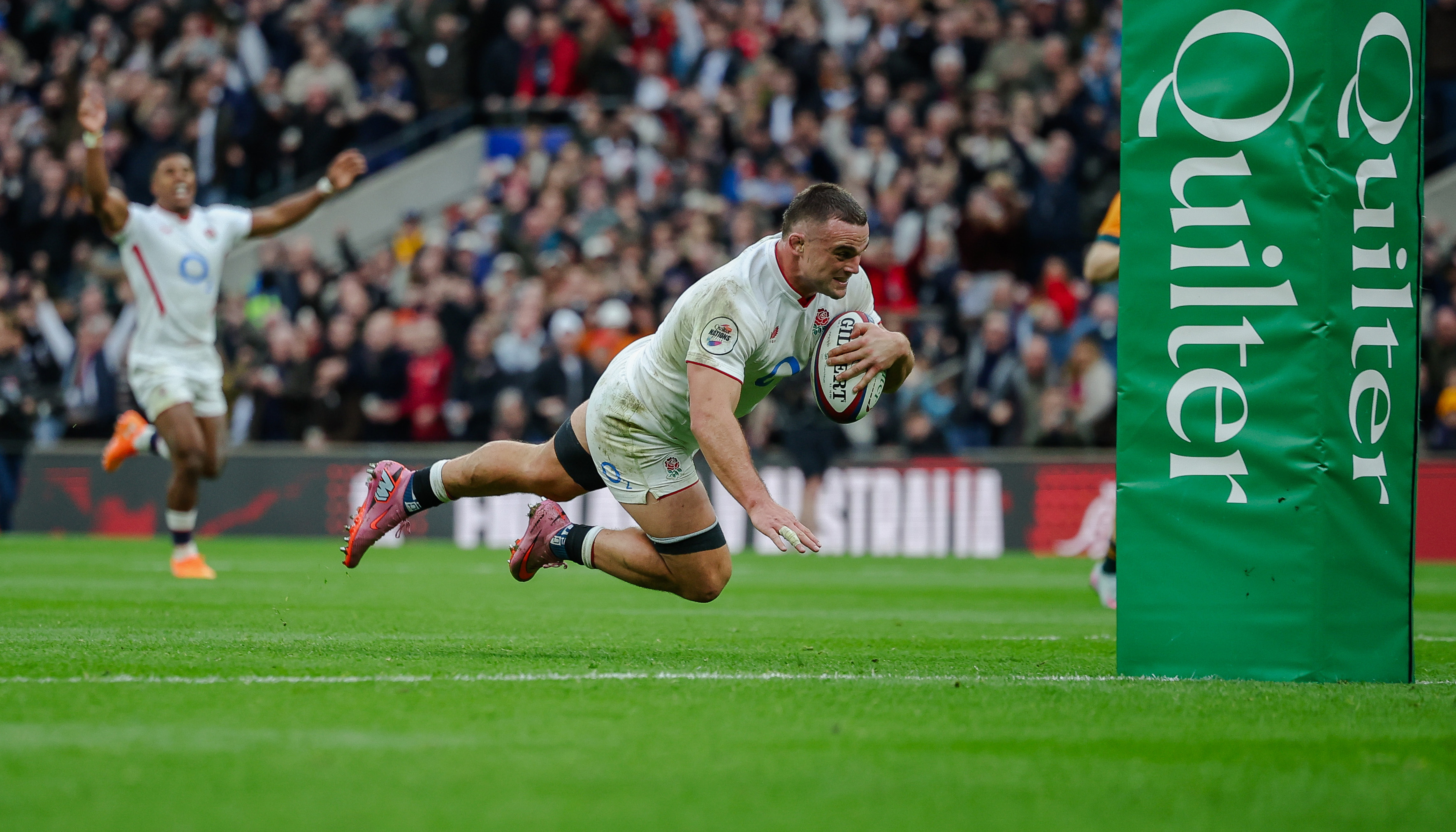 Ben Earl of England scores a try and celebrates.
