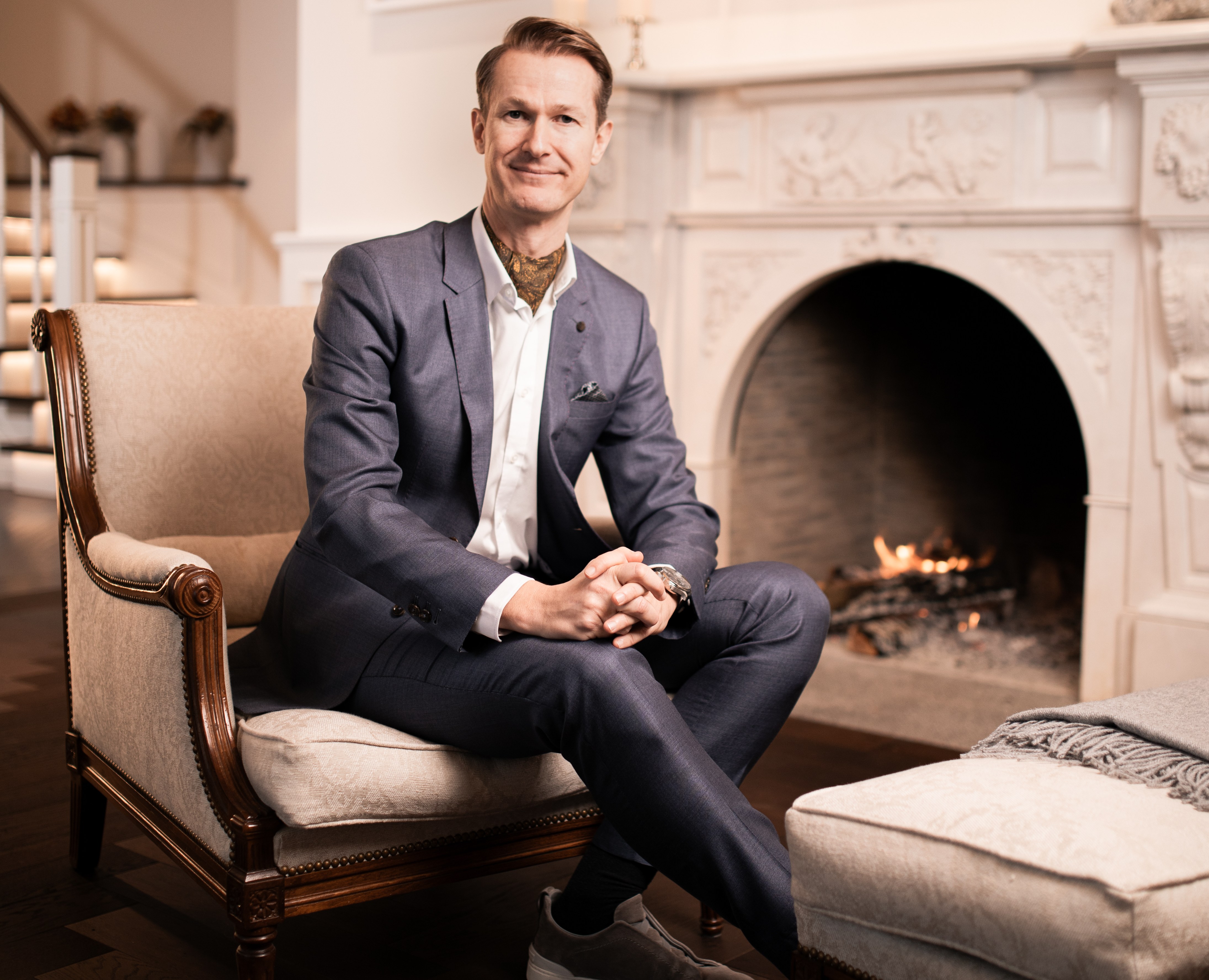 Jan Gerber, CEO & founder of Paracelsus Recovery, sitting in a chair.