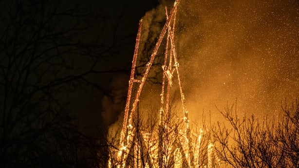 The tower of the Vondelkerk church in Amsterdam on fire
