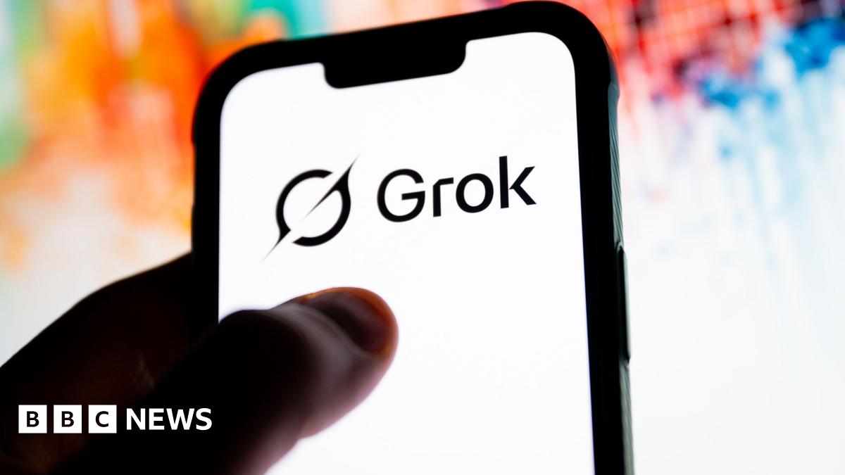 A phone with the Grok logo on it and a colourful background