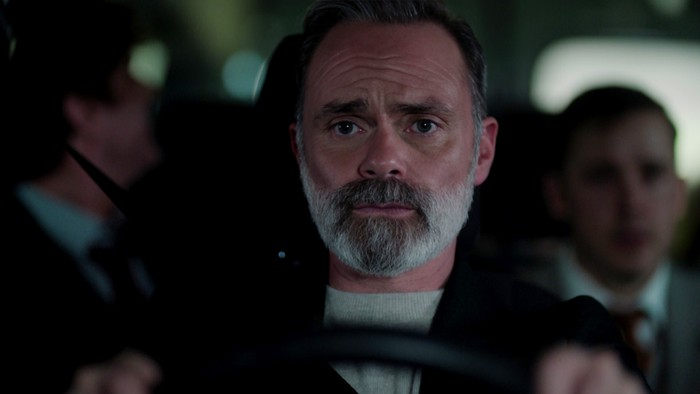 Billy looks worried driving a minibus in Corriedale