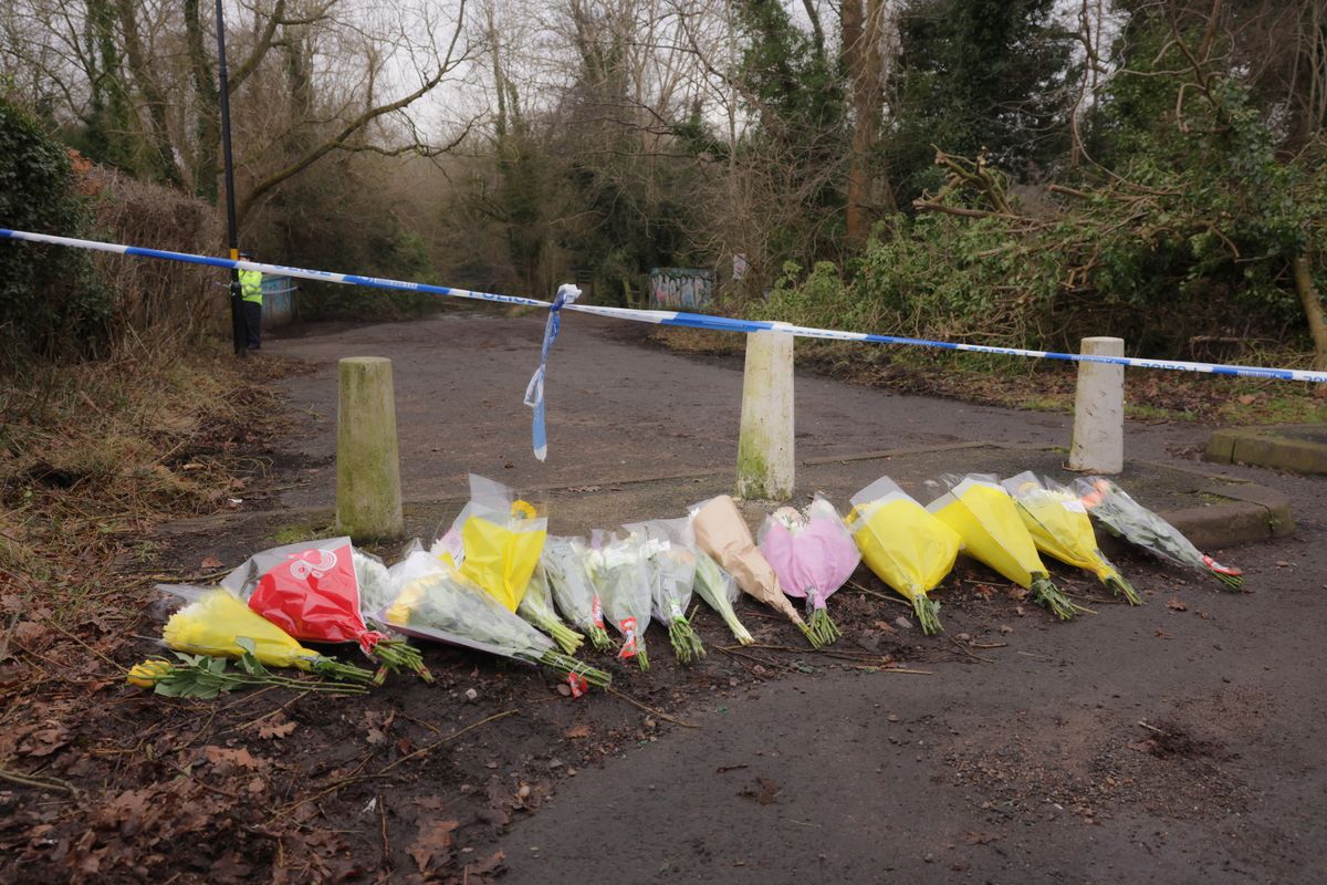 Floral tributes at the scene on Scribers Road in Hall Green in Birmingham after a 12-year-old boy was stabbed