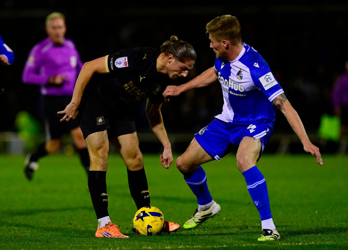 Argyle striker Lorent Tolaj battles for the ball with Bristol Rovers defender Taylor Moore during the Vertu Trophy tie at the Memorial Stadium on January 13, 2026 -. Photo: Tom Sandberg/PPAUK