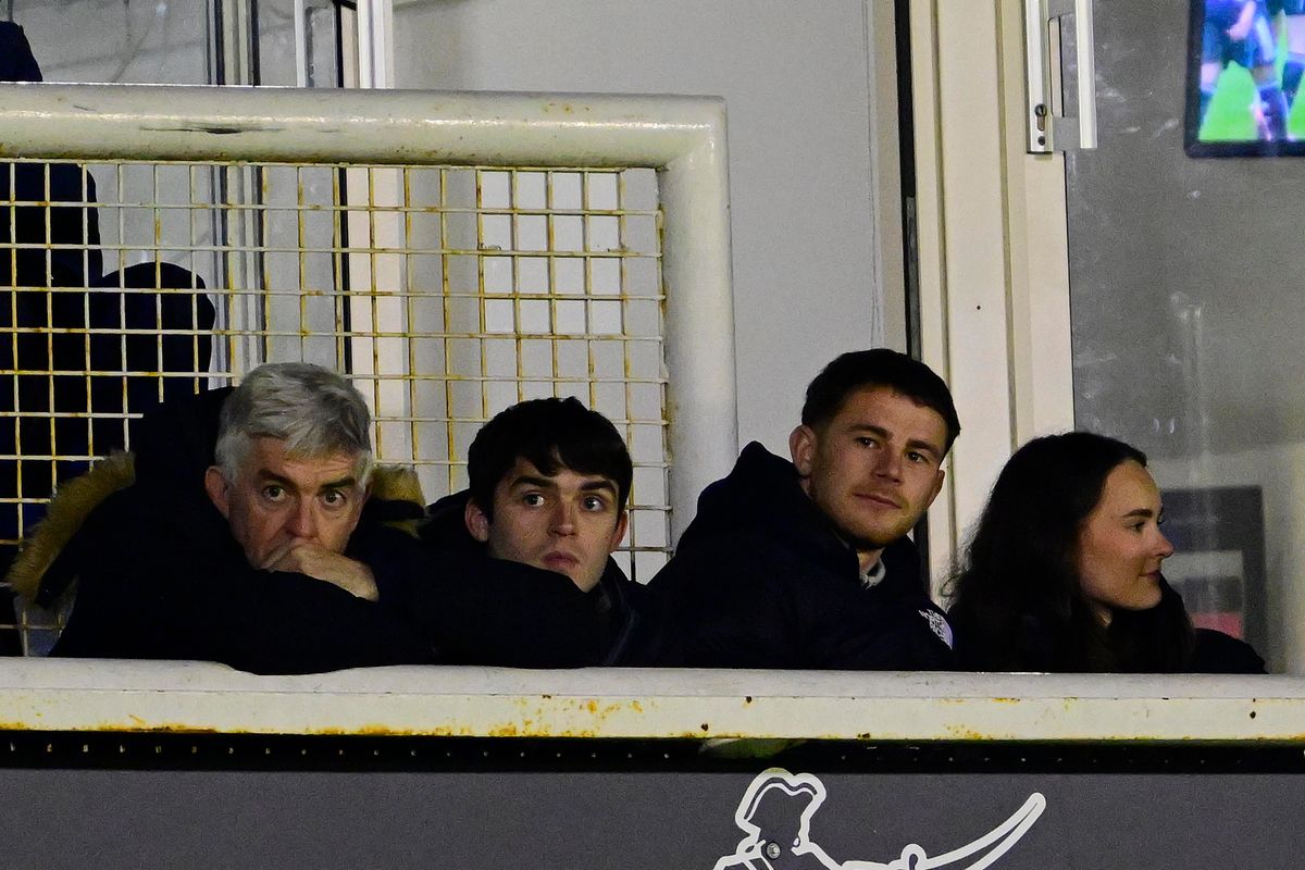 Former Argyle midfielder Adam Randell (second from right) was among those watching the Pilgrims in Vertu Trophy action against Bristol Rovers at the Memorial Stadium on January 13, 2026. The Pilgrims' chief executive officer Paul Berne is first on the left - Photo: Tom Sandberg/PPAUK