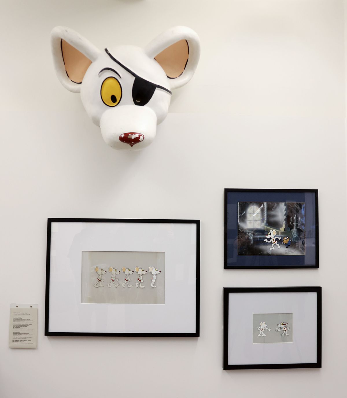 The collection features artwork, models, and props used in shows like Danger Mouse and Noddy