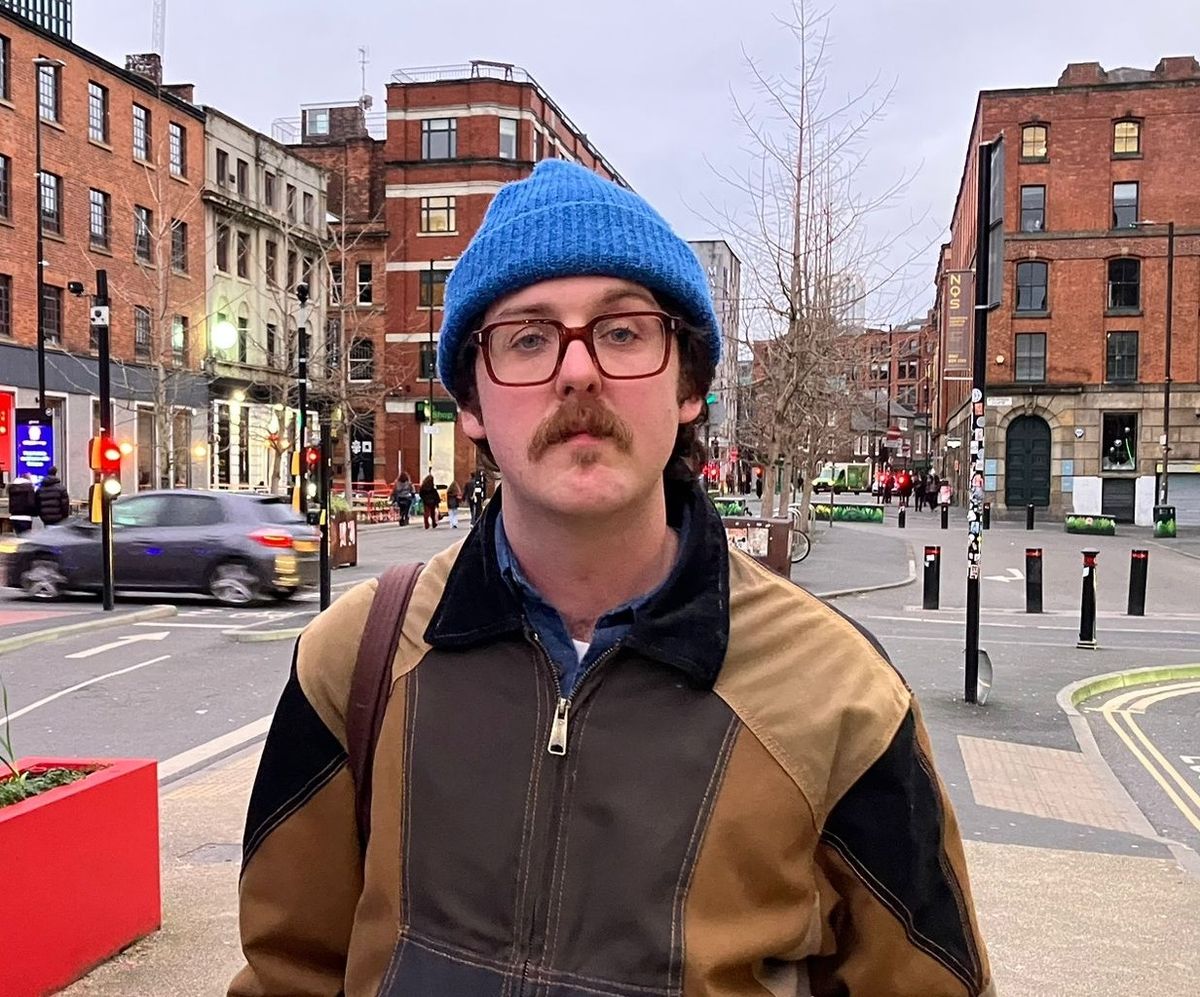 Interior decorator interviewed about new years resolution on a Manchester street