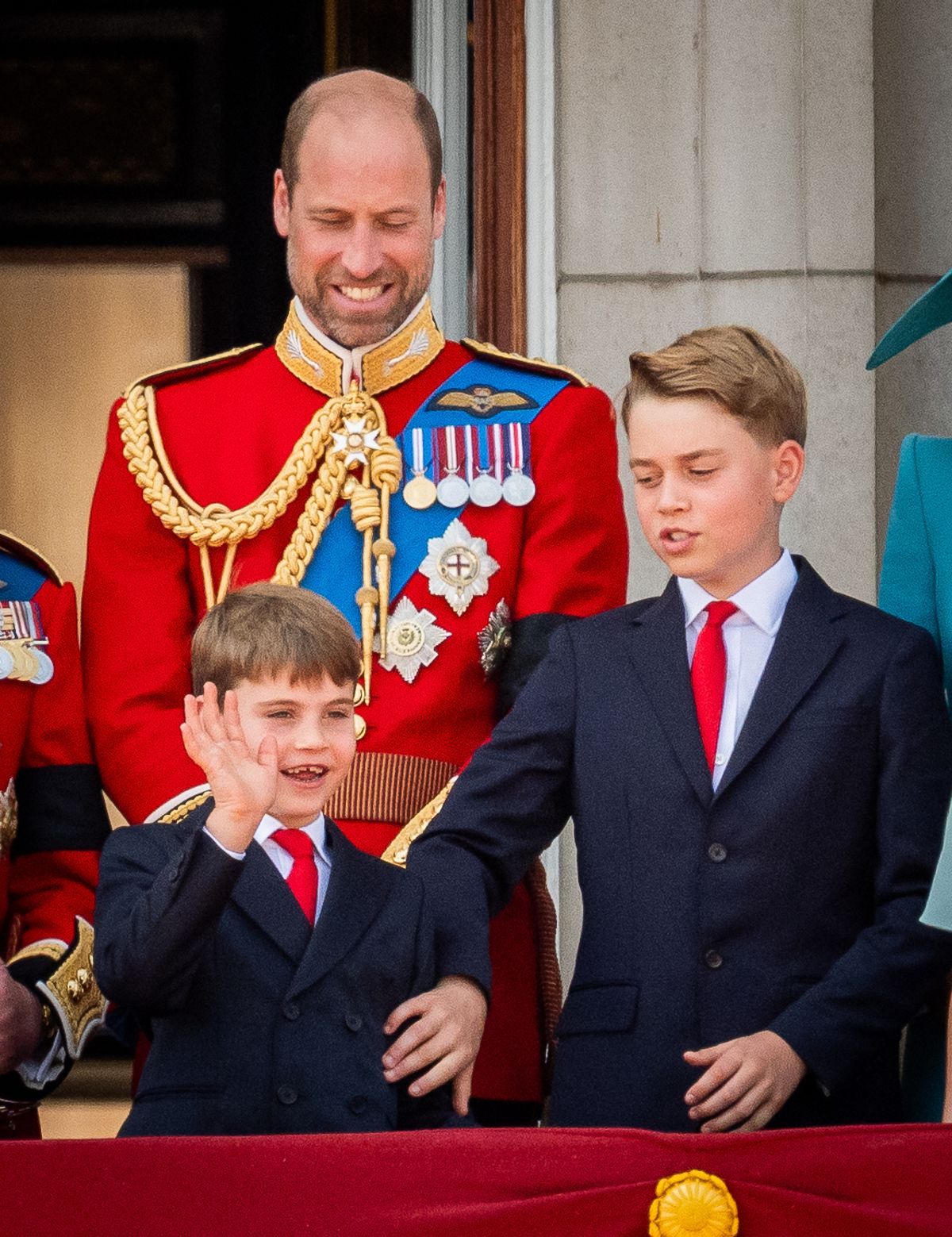 Prince Louis, the Prince of Wales and Prince George on the balcony of Buckingham Palace, London, to view the flypast following, the Trooping the Colour ceremony in central London, as King Charles III celebrates his official birthday.