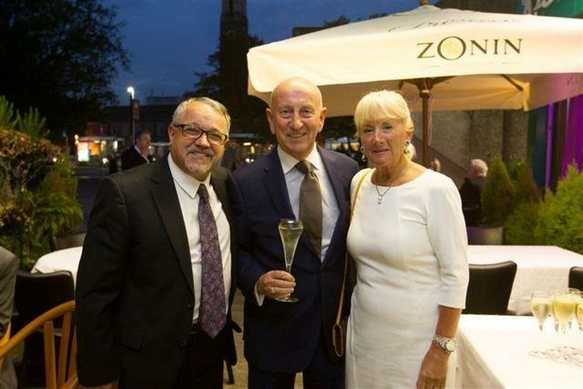 Puccini’s owner Michele Pucci with Salford bookmaker Fred Done and his wife Mo at one of the restaurants' many charity fundraising nights