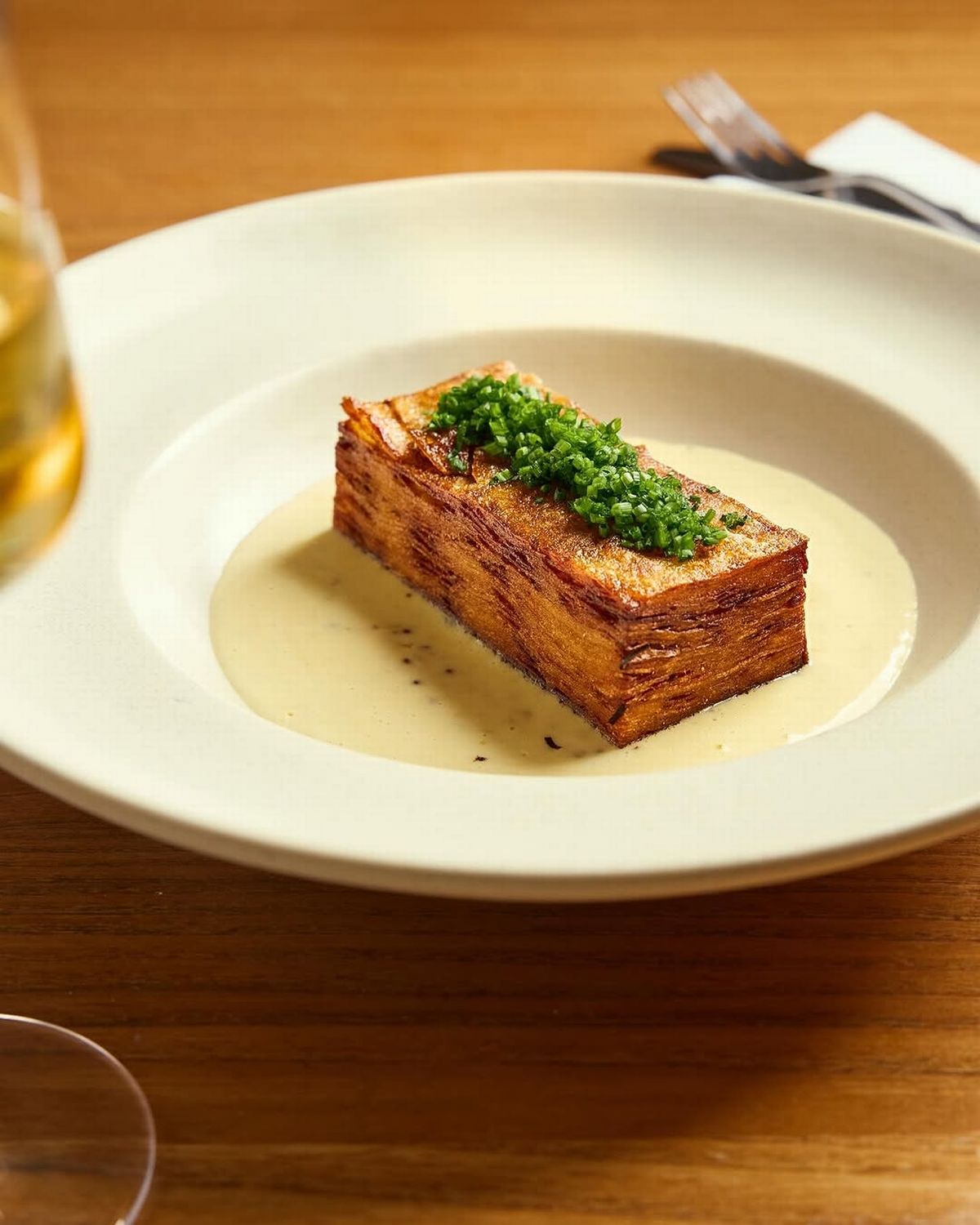 The Pommes Anna’s - featuring layers of crispy potato and a rich mustard cream - from Soots