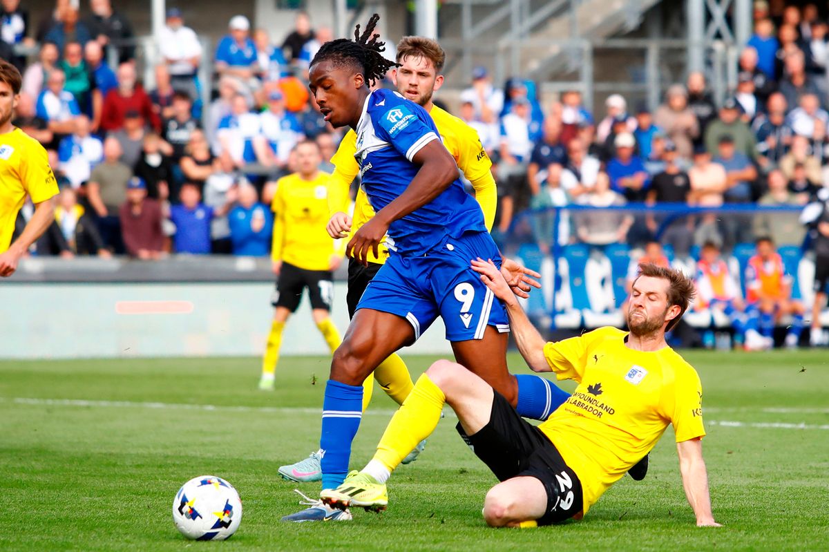 Promise Omochere of Bristol Rovers is tackled by Tom Barkhuizen of Barrow during the EFL League Two match between Bristol Rovers and Barrow at The Memorial Stadium on 13 September 2025 in Bristol, England (Photo by Steve Taylor/PPAUK)
