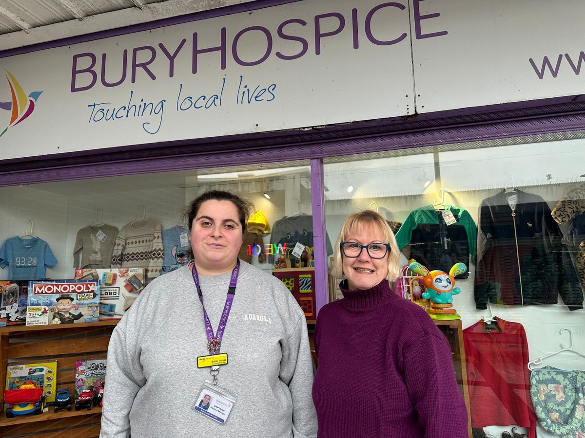Sahar Lodge (left), interim manager at Bury Hospice, and Julie Callaghan (right), a volunteer who has been with the shop for four years.