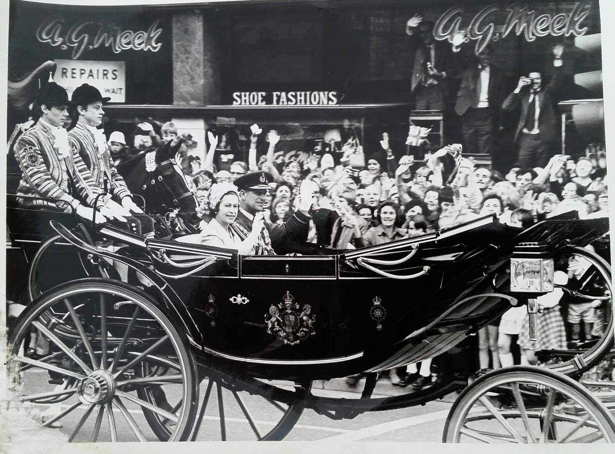 the shop in Duke Street opposite the Cardiff Castle with the Queen passing on the occasion of her silver Jubilee in 1977