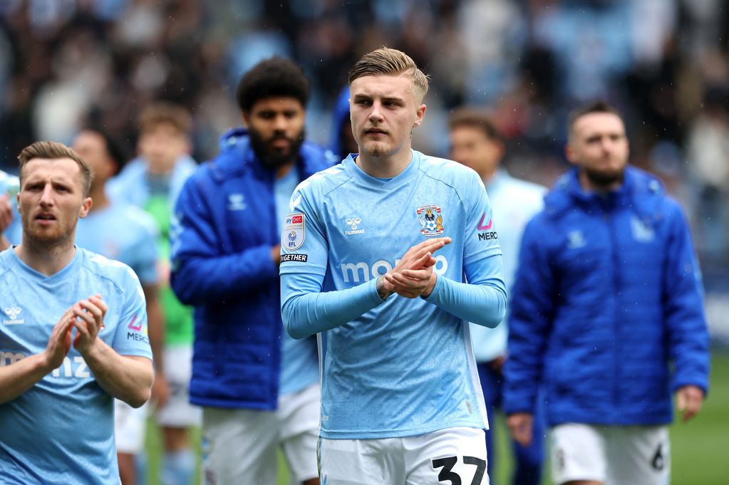 Coventry City's Norman Bassette applauds the fans
