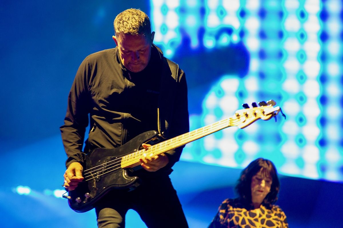 New Order playing at Wythenshawe Park in August 2024