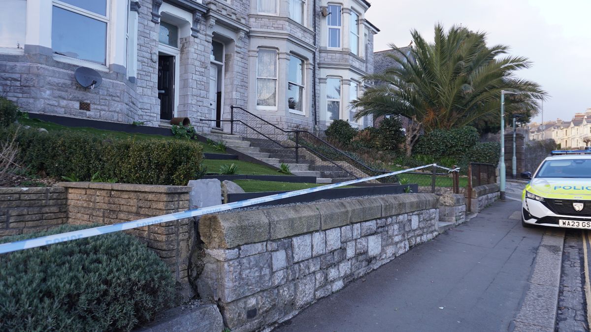 Police on scene guard following acid attack incident in Lipson Road, Plymouth