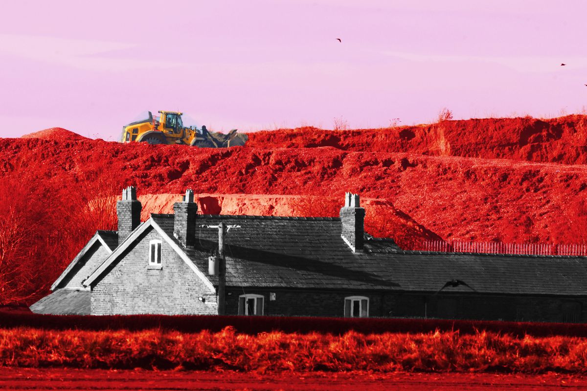 A large mound of material on Simonswood Industrial Estate near Kirkby