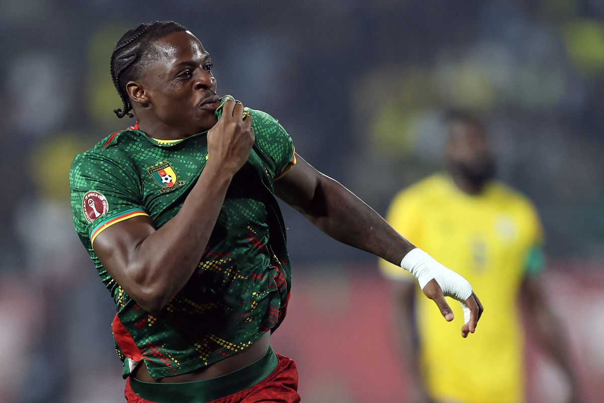 Karl Etta Eyong celebrates scoring for Cameroon at the Africa Cup of Nations