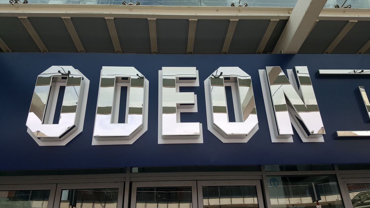 The shiny new Odeon Luxe sign at the entrance to the former Odeon Birmingham Broadway Plaza, which was an AMC site until 2012
Pictures from a backstage tour of the new Odeon Luxe cinema at Broadway Plaza which is set to be fully completed within two weeks in  mid June, 2018.
Every screen will have reclining seats with tables when Odeon's giant Broadway Plaza site is renamed Odeon Luxe Birmingham
It has been converted into Britain's biggest luxury cinema in the city where the company was founded in 1930.
Set to be renamed as Odeon Luxe Birmingham, work is almost finished on the ambitious plan to turn all 12 screens into bespoke theatres, giving every customer the chance to sit in an electrically-powered reclining chair with individual retractable tables.
All eight screens upstairs were converted during the early spring before work began in April to transform the four ground floor screens.
Odeon Luxe Birmingham general manager Susan Harrison said: ''We're extremely proud that Birmingham will be home to the Midlands' first Odeon Luxe cinema.
"With Odeon having such a strong connection to the city -including its first cinema being built here in 1930 -  it really has been fantastic to see the journey the cinema has undertaken over the past months.
"It has been transforming into the ultimate luxury venue for film fans to enjoy for many more years to come."
Seating in the iSense screen has also been converted, even though it was only created from Screen 1 in October 2012 in time for the release of James Bond thriller Skyfall. Odeon's alternative screen to IMAX will still have 4K projection and Dolby ATMOS sound.
The other 11 standard screens will have improved picture quality with Dolby 7.1 surround sound delivered through 190 brand new speakers.
The cinema has stayed open throughout the transformation process, albeit with a reduced number of screens operating.
When US company AMC first opened the site it had 2,909 seats in 12 screens.
Odeon took it over in the summer of 2012, but although the number of screens will stay the same when it open in June the number of seats will have gone down to 1,264.
But the upside is that they will offer films fans triple the legroom and increased personal space while making booking near essential for new blockbusters at peak times.
Anyone hard of hearing will be able to use a new Dolby Fidelio Audio Description system and an upgraded hearing-impaired system across all screens.
Current prices are £12 for adults, £9.50 for teens (13-17) and £10 for seniors. Words, pictures and video by Graham Young

