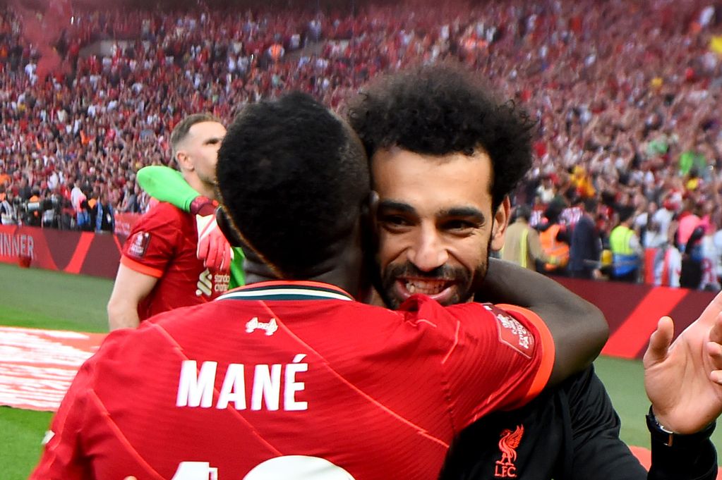 Mohamed Salah and Sadio Mane embrace after the FA Cup final in May 2022.