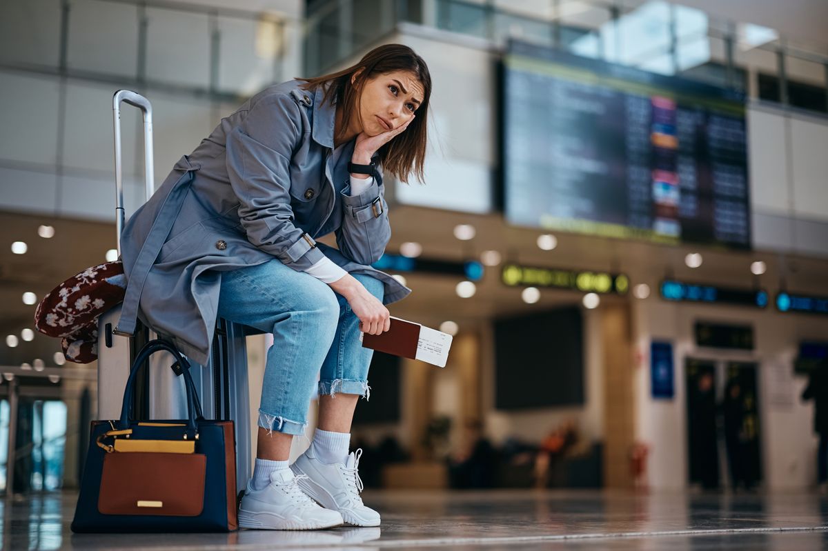 Stressed woman at airport