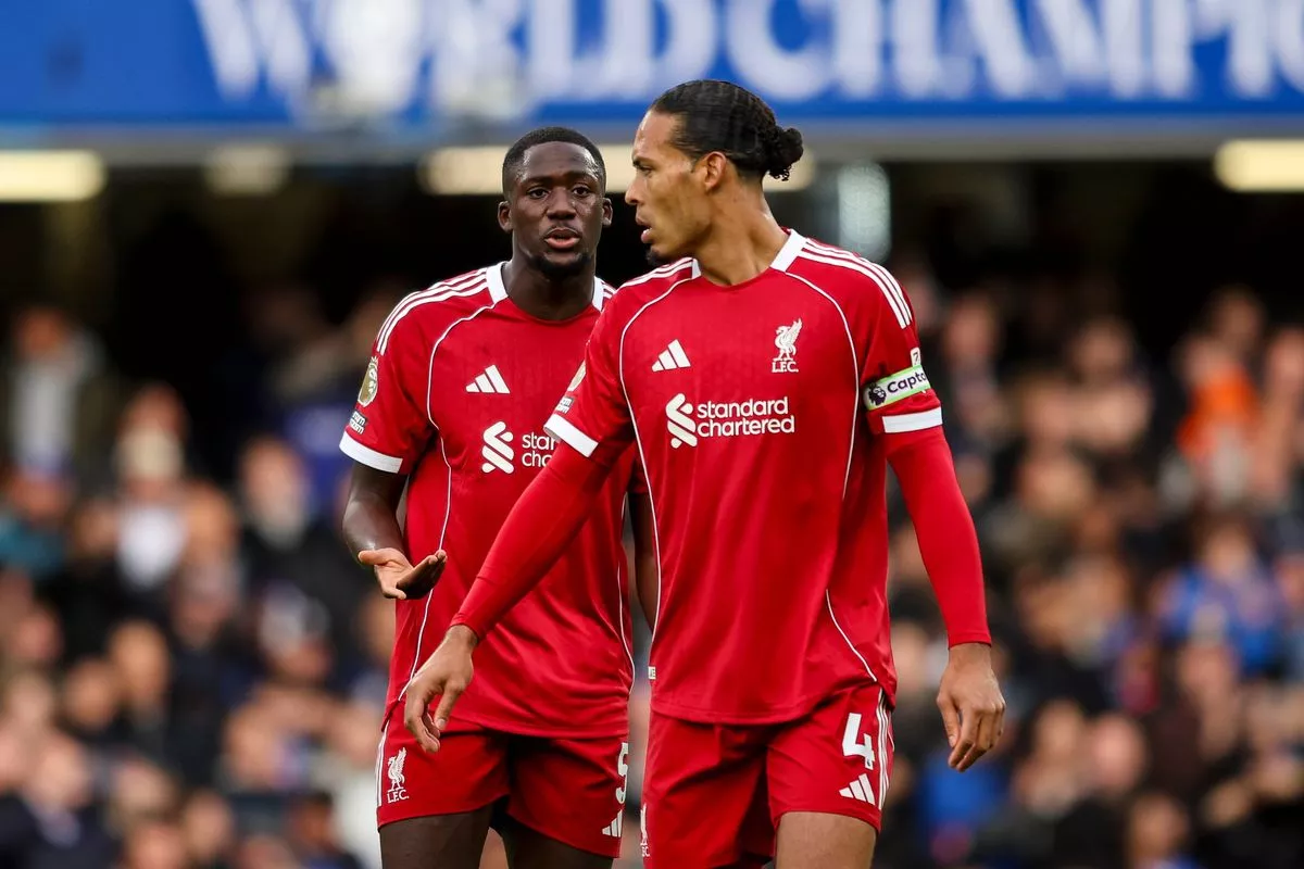 Ibrahima Konate and Virgil van Dijk look on