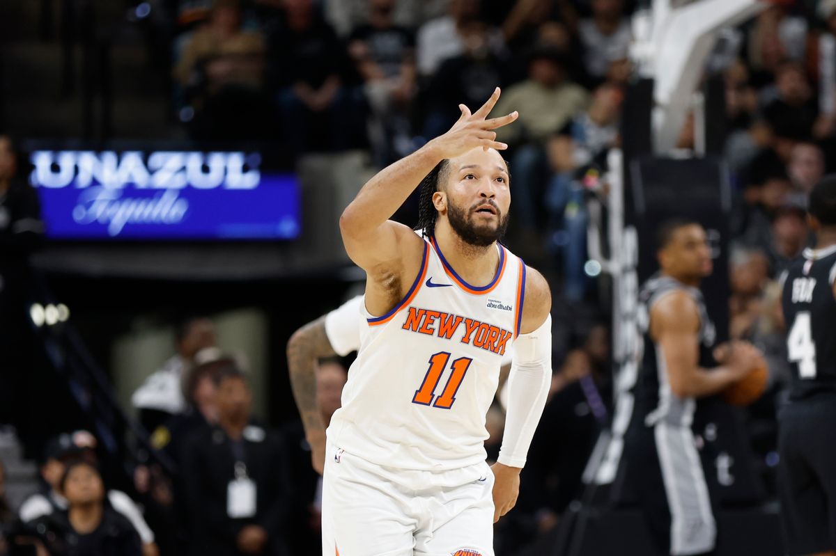 SAN ANTONIO, TX - DECEMBER 31: Jalen Brunson #11 of the New York Knicks reacts after hitting a three-pointer against the San Antonio Spurs in the second half at Frost Bank Center on December 31, 2025 in San Antonio, Texas. NOTE TO USER: User expressly acknowledges and agrees that, by downloading and or using this photograph, User is consenting to terms and conditions of the Getty Images License Agreement. (Photo by Ronald Cortes/Getty Images)