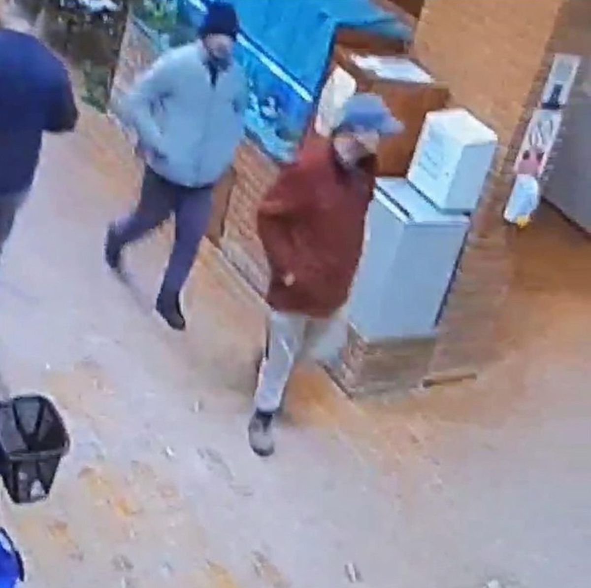 CCTV image of Matthew Armstrong, 35, (front) and Daniel Washbourne, 40, (following)