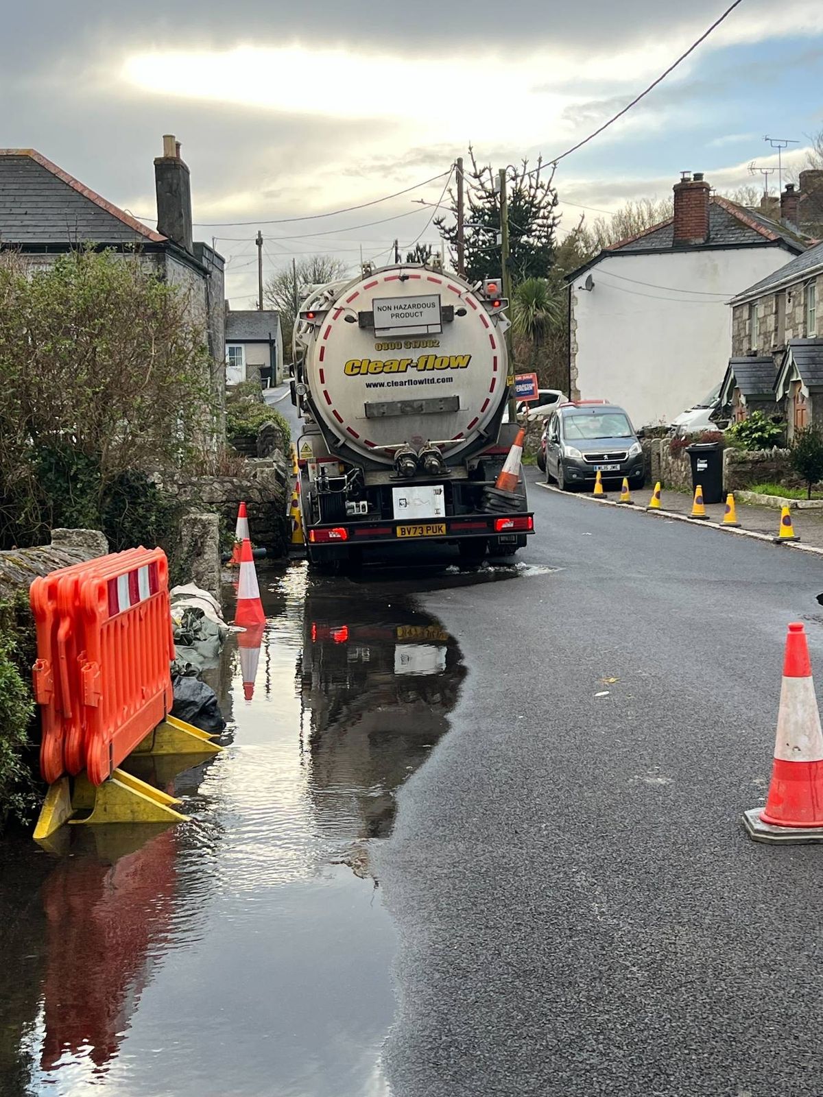 A tanker turns up to pump out sewage out of an overflowing drain in Foundry, Stithians