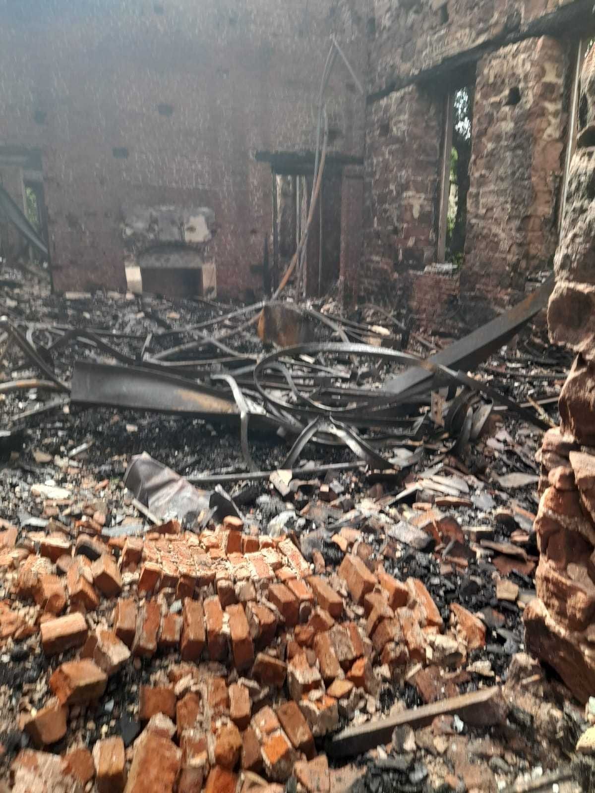 Inside the fire damaged Woolton Hall after the fire last year