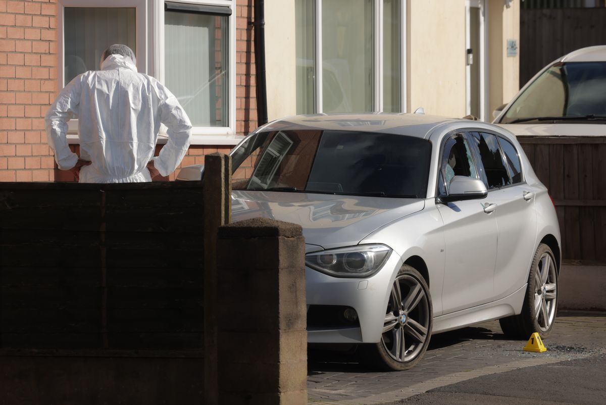 Police at the scene in Charles Foster Street, Darlaston.