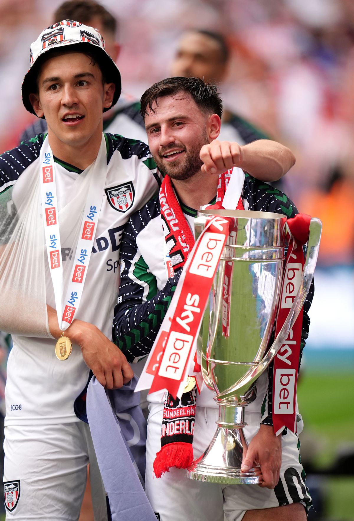 Luke O'Nien and Patrick Roberts celebrating Sunderland's promotion to the Premier League