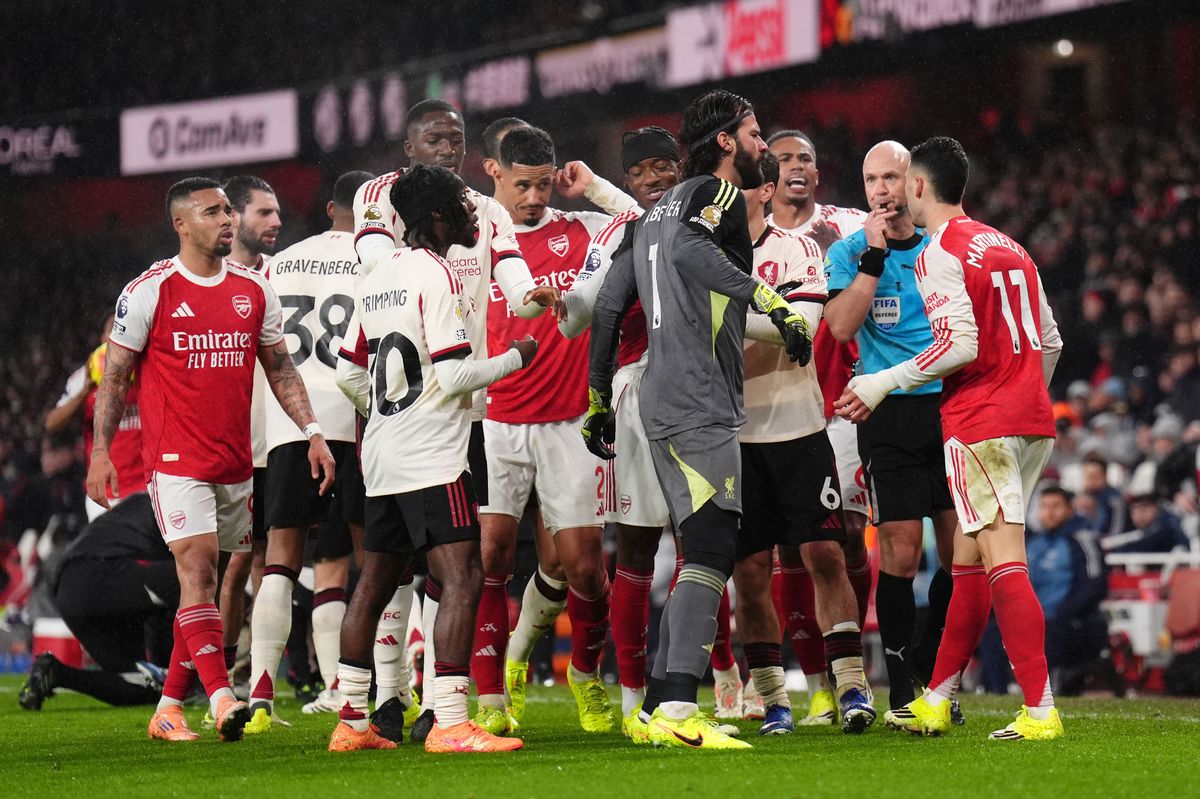 Liverpool players confront Arsenal's Gabriel Martinelli following his manhandling of Conor Bradley