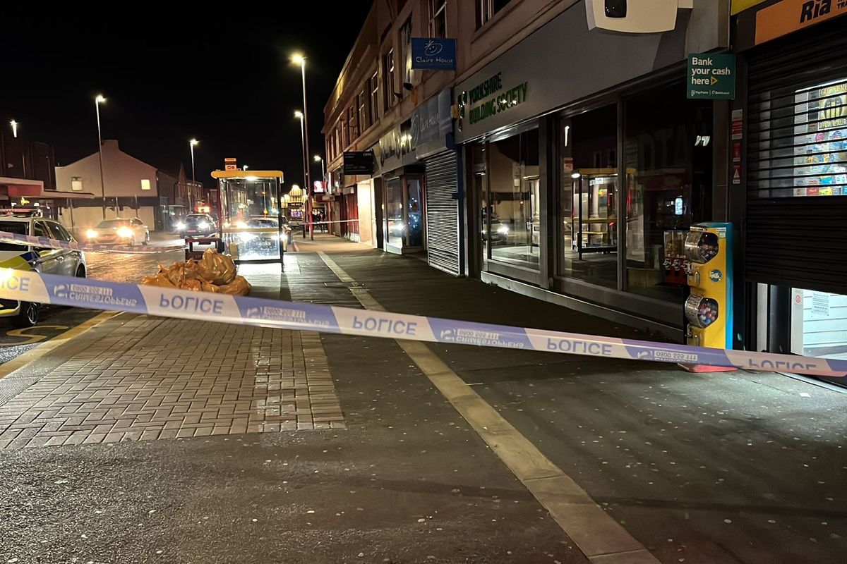 Police outside the Stop and Shop Premier store on Wallasey Road, Liscard on Boxing Day 2025.