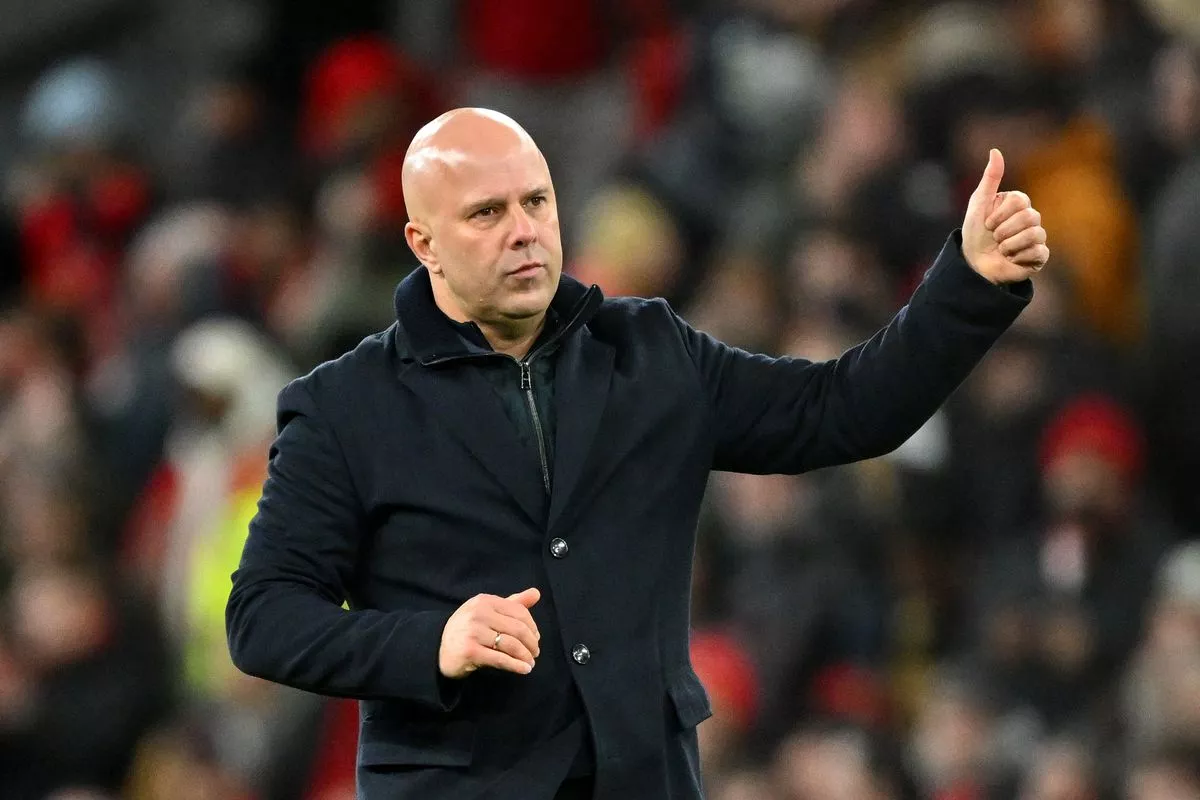 LIVERPOOL, ENGLAND - JANUARY 12: (THE SUN OUT, THE SUN ON SUNDAY OUT) Arne Slot, Manager of Liverpool, gestures a 'thumbs-up' towards the fans following the team's victory in the Emirates FA Cup Third Round match between Liverpool and Barnsley on January 12, 2026 in Liverpool, England. (Photo by Liverpool FC/Liverpool FC via Getty Images)