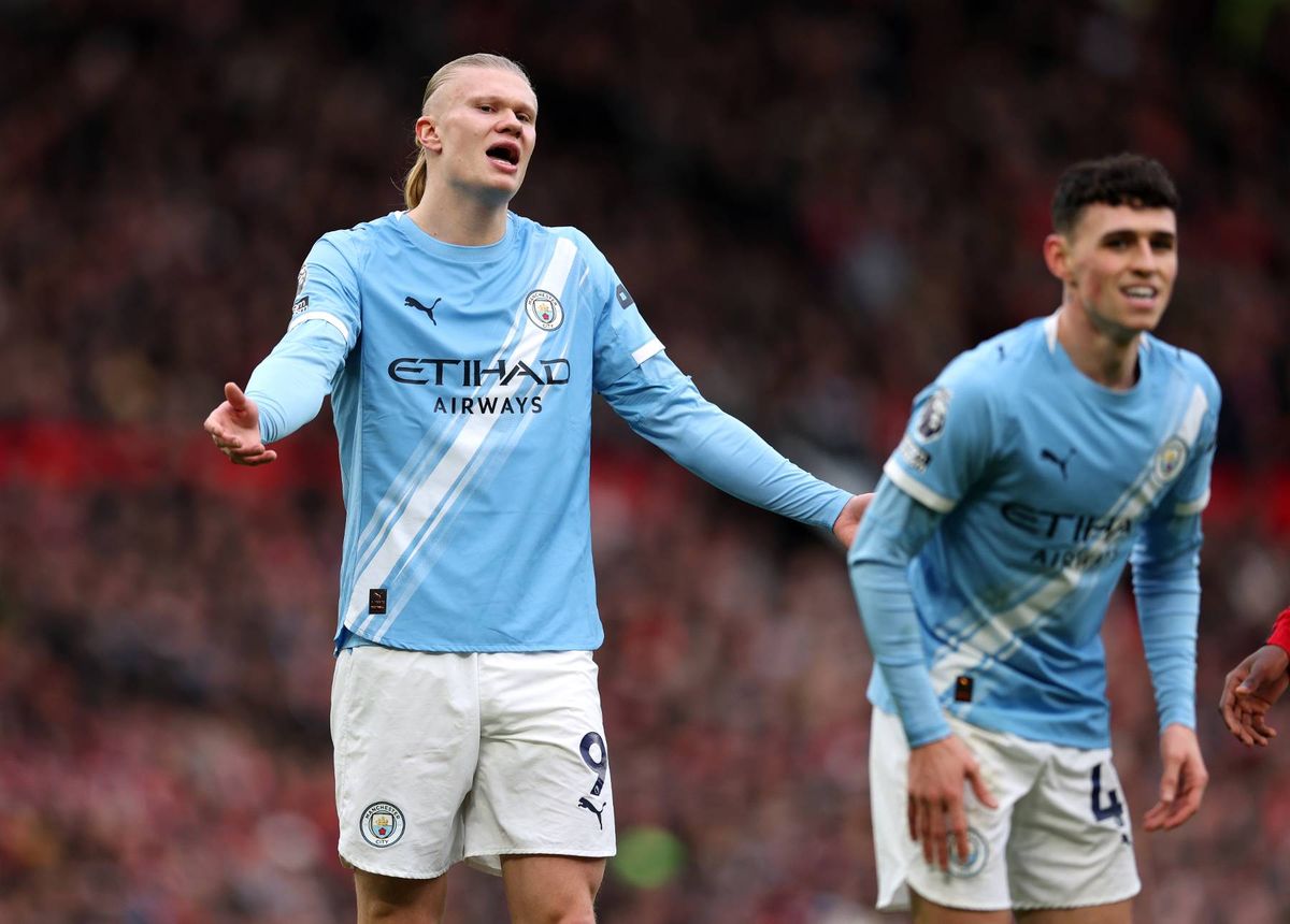 Erling Haaland looks dejected during the Premier League match between Manchester United and Manchester City at Old Trafford.