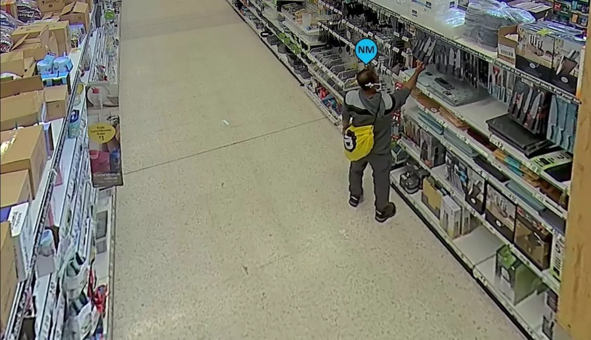 CCTV of Nimalarajah Mathiyadaranam browsing the aisles of Asda in Bootle for knives hours before he stabbed his wife Nilani Nimalarajah to death
