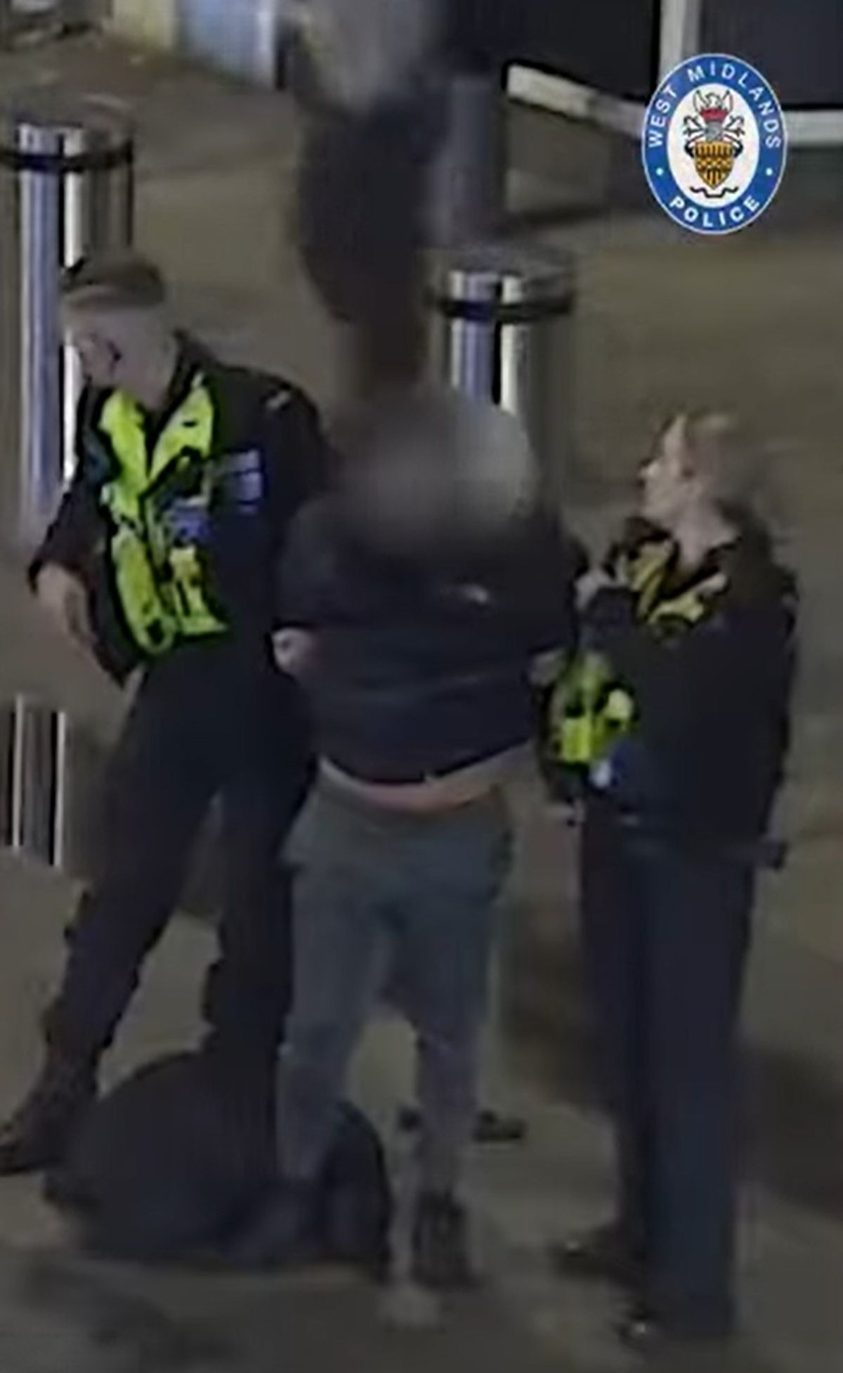 PCs Keelan Walsh and Jess Roughley detain one suspected motorbike thief in Navigation Street, Birmingham, but another got away 