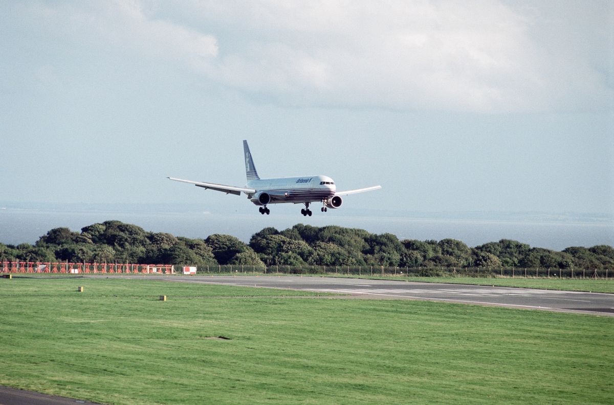 Plane landing on a runway