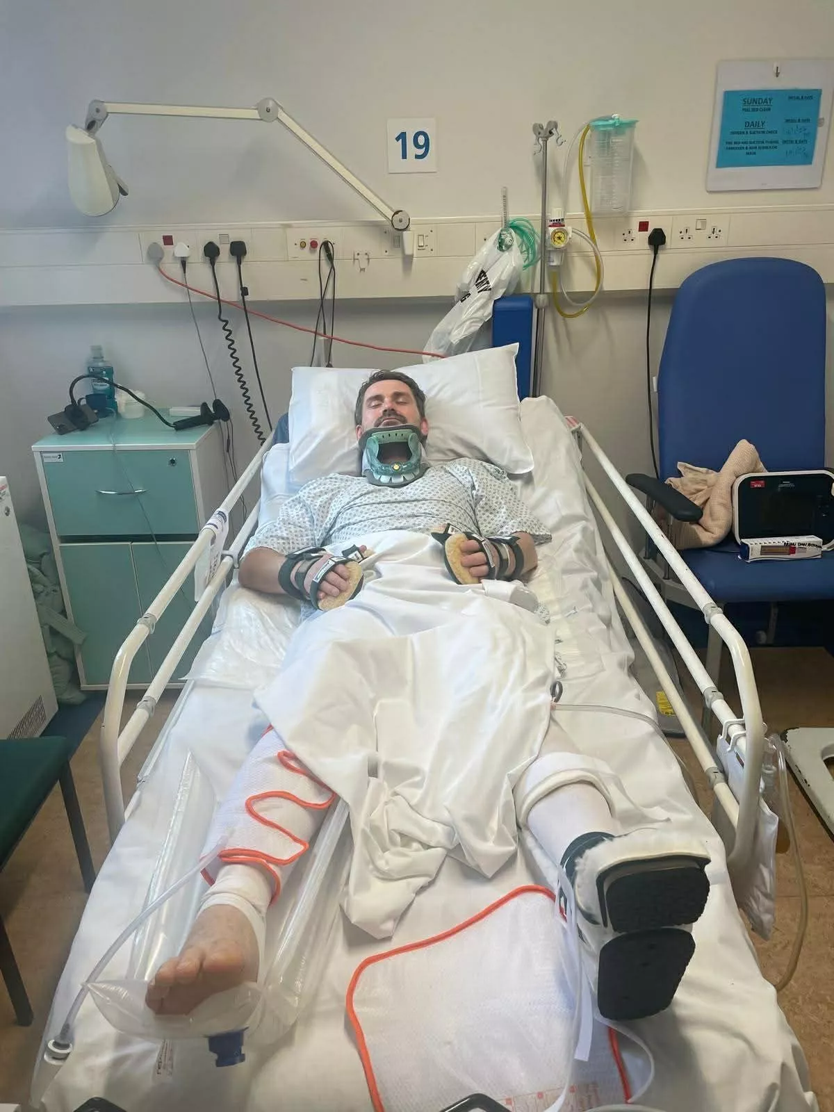 A picture of a man in a hospital bed
